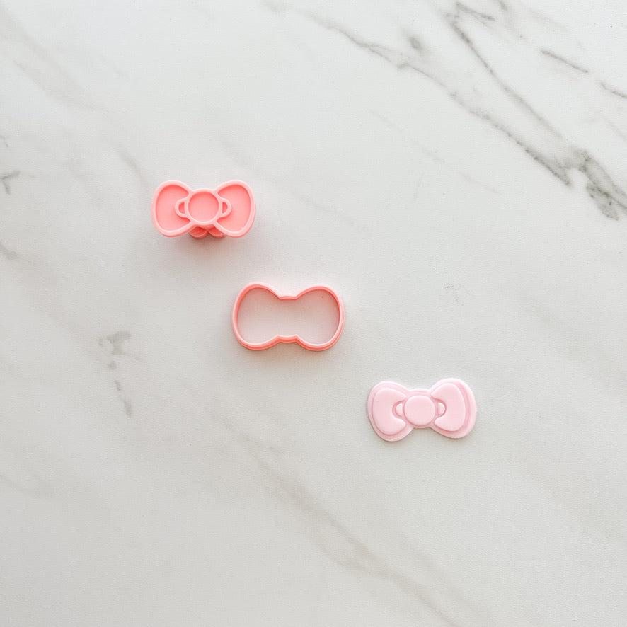 HELLO KITTY BOW CUTTER/ EMBOSSER BY CREATIVE HEART LAB