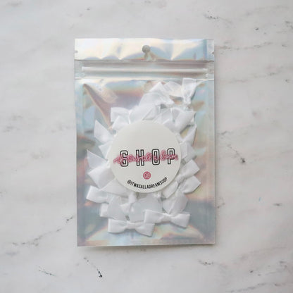 PRE TIED TINY SATIN BOWS (WHITE)