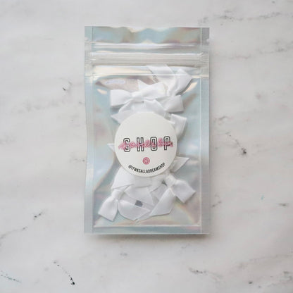 PRE TIED TINY SATIN BOWS (WHITE)
