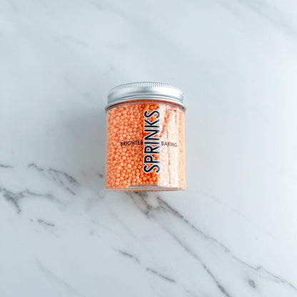 PASTEL PEACH NONPAREILS BY SPRINKS
