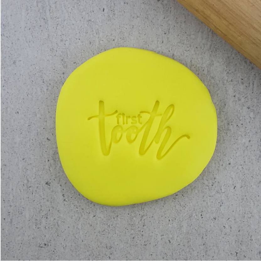 FIRST TOOTH EMBOSSER